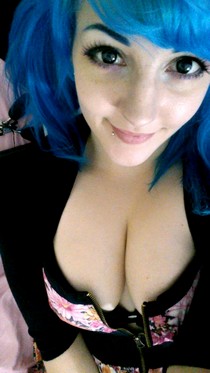 Busty chick spreading legs
